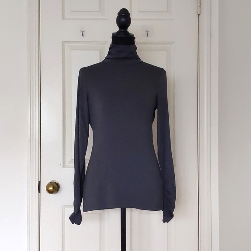NWT. The Limited Rayon Spandex Grey Elastic Design On Sleeve and Turtleneck Top.